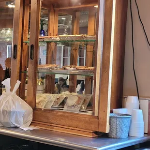 a display case with a variety of dishes