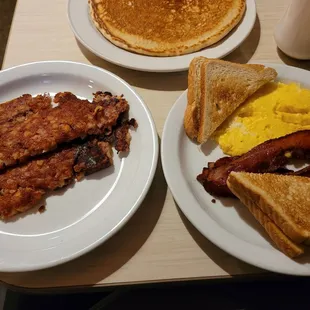 Two eggs, bacon, toast, and perfectly crispy corned beef hash!