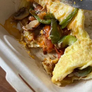 Inside veggie omelette, full of veggies. Very good.