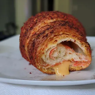 Flamin&apos; Hot Cheeto croissant with nacho cheese filling