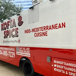 a red and white food truck