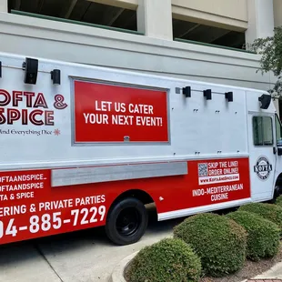 a food truck parked in front of a building