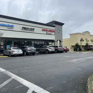 a parking lot in front of a restaurant