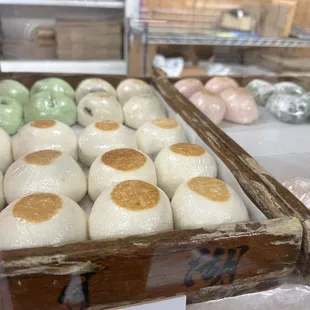 Bean paste mochi showcased in the original wooden cases used by their grandfather when the store first opened.
