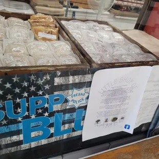 a display case with a variety of doughnuts