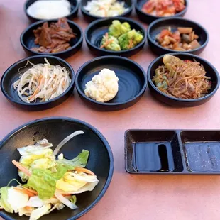 Banchan - 9+ side dishes. Lettuce + ssamjang (fermented soybean paste) are by request.