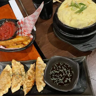 French Fries, Steamed Egg Hot Pot, and Potstickers at Kogi Gogi BBQ in San Francisco.