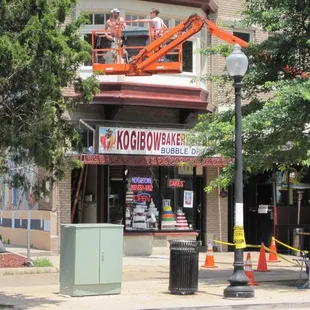 a man on a cherry picker