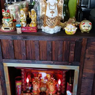 a buddha statue on a table