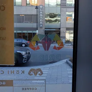 a car parked in front of a coffee shop