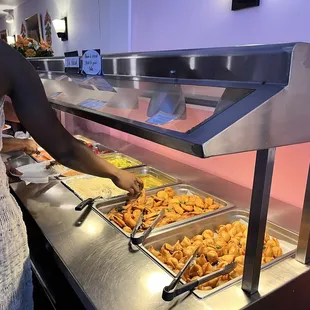 a woman serving food