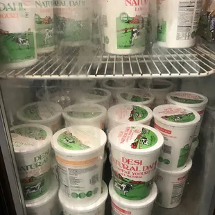 a refrigerator full of yogurts