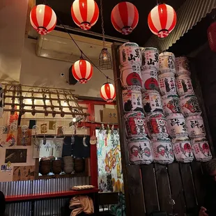 red and white lanterns hanging from the ceiling