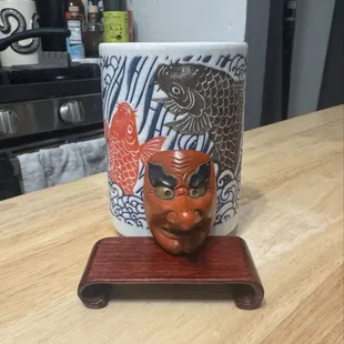 1980s Tengu piece made in China, a little display stand and a koi teacup.
