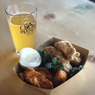 a glass of beer and fried chicken