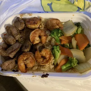 Steak shrimp veggies and fried rice