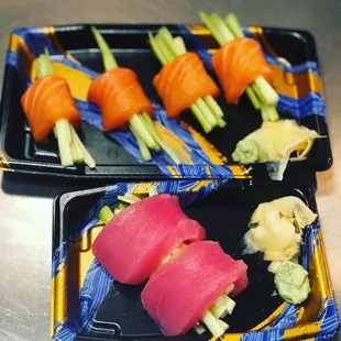 two trays of sushi
