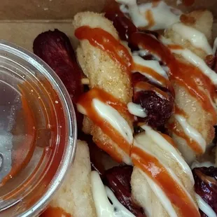 a hot dog with ketchup