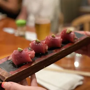 a person holding a plate of food