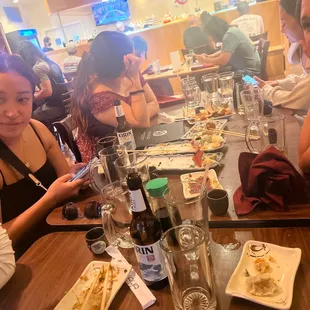 Table full of empty drinks.