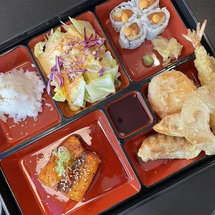a bento box of food