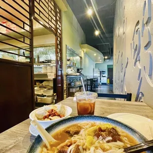 a plate of noodles and meatballs