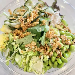 a salad in a clear bowl