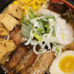 a close up of a bowl of ramen