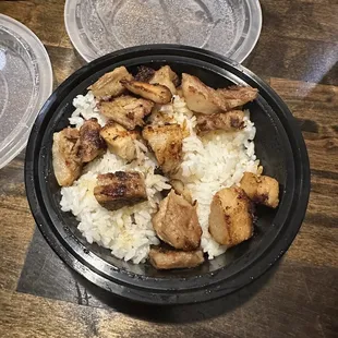 The kids pork chashu bowl with no sauce, seaweed, or green onions.