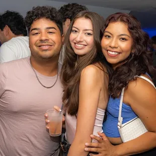 a group of people posing for a picture