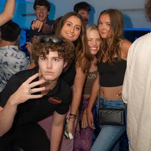 a group of people posing for a picture