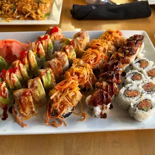 Left to right: Red dragon roll, TNT roll, Volcano roll, Snake Roll, Spicy Tuna Sushi Roll