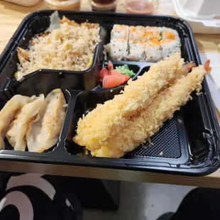 a bento box of food