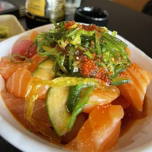 Poke salad. No greens just ocean salad on top. Great amount of fish. Not real Hawaiian poke so dont expect it.