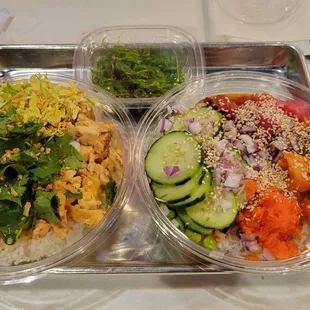 Two Poke bowls and a seaweed salad side.