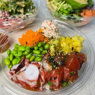 a variety of poke bowls