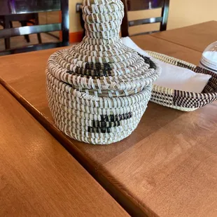 a basket on a wooden table