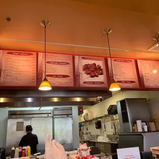 a restaurant counter and menus