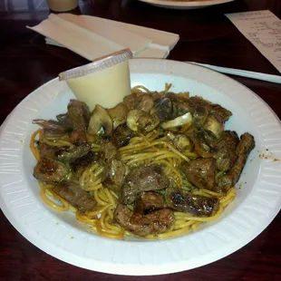Yakisoba noodle with steak and mushroom. Shrimp sauce on the side