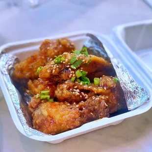 a take out container of food