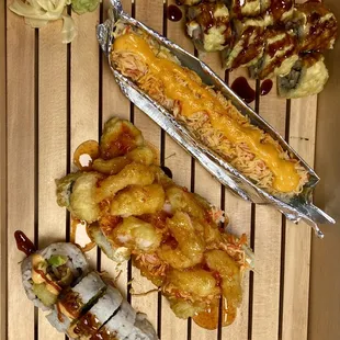 From bottom left to top right, Mexican Roll, Chili Shrimp Roll, Fire Cracker Roll, Yum Yum Roll