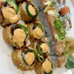 Las Vegas Roll (front), S&amp;T Roll (middle), Philadelphia roll (back)