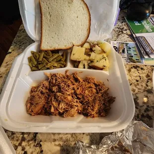 Pulled pork, green beans, parsley potatoes, corn muffin