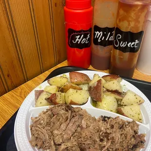 Pulled pork dinner with parsley potatoes.