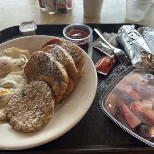 French toast with eggs, fruit, sausage, 2 breakfast tacos for under $20!