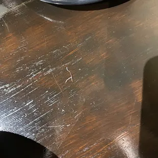 It was plastic in my udon (I pulled on it and it stretched and broke)