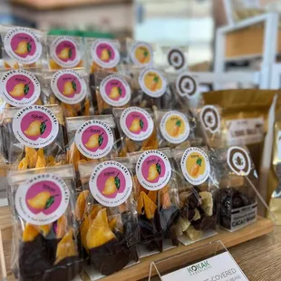 Dark Chocolate dipped dried mangoes  Perfect mid-day treat!   Kokak Chocolates: Chocolate Shop in San Francisco