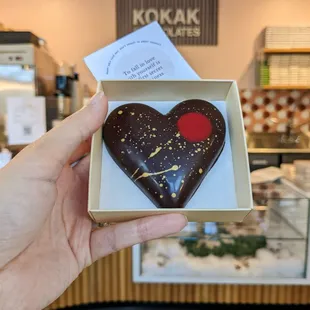 Dark Chocolate Bar Self Love Kit. Dance to your fave 80s music, sip vintage wine, take a bite of this special bar w/ raspberry and hazelnut.