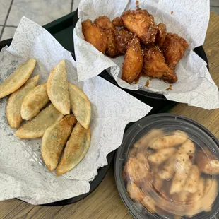 Fried dumplings, honey bee wings, fried rice cakes