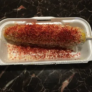 This was the half container I was expected to take my corn to-go in.  I was told I could not have a complete to-go container.